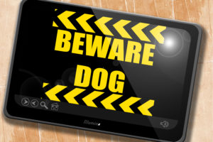 Beware of dog sign in black and yellow that can prevent the need for a dog bite attorney