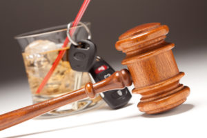 Gavel, Alcoholic Drink & Car Keys, which implies the need for a drunk driving accident attorney