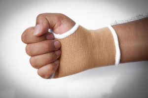Close-up of a man's hand splint for broken wrist bone