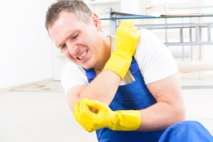 a man suffering from a personal injury at the job